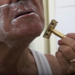 Senior man shaving
